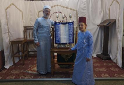 Samaritan Priest and child with the Torah 